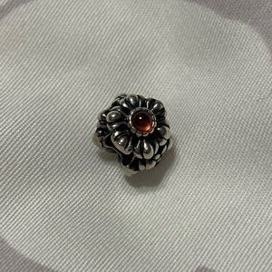 Authentic Pandora Birthday Blooms charm - garnet